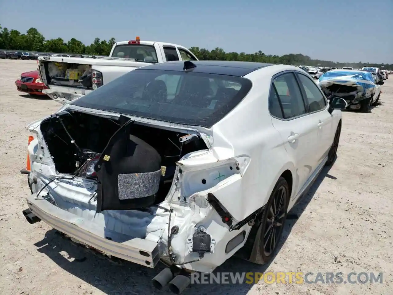 4 Photograph of a damaged car 4T1K61AK8MU603849 TOYOTA CAMRY 2021