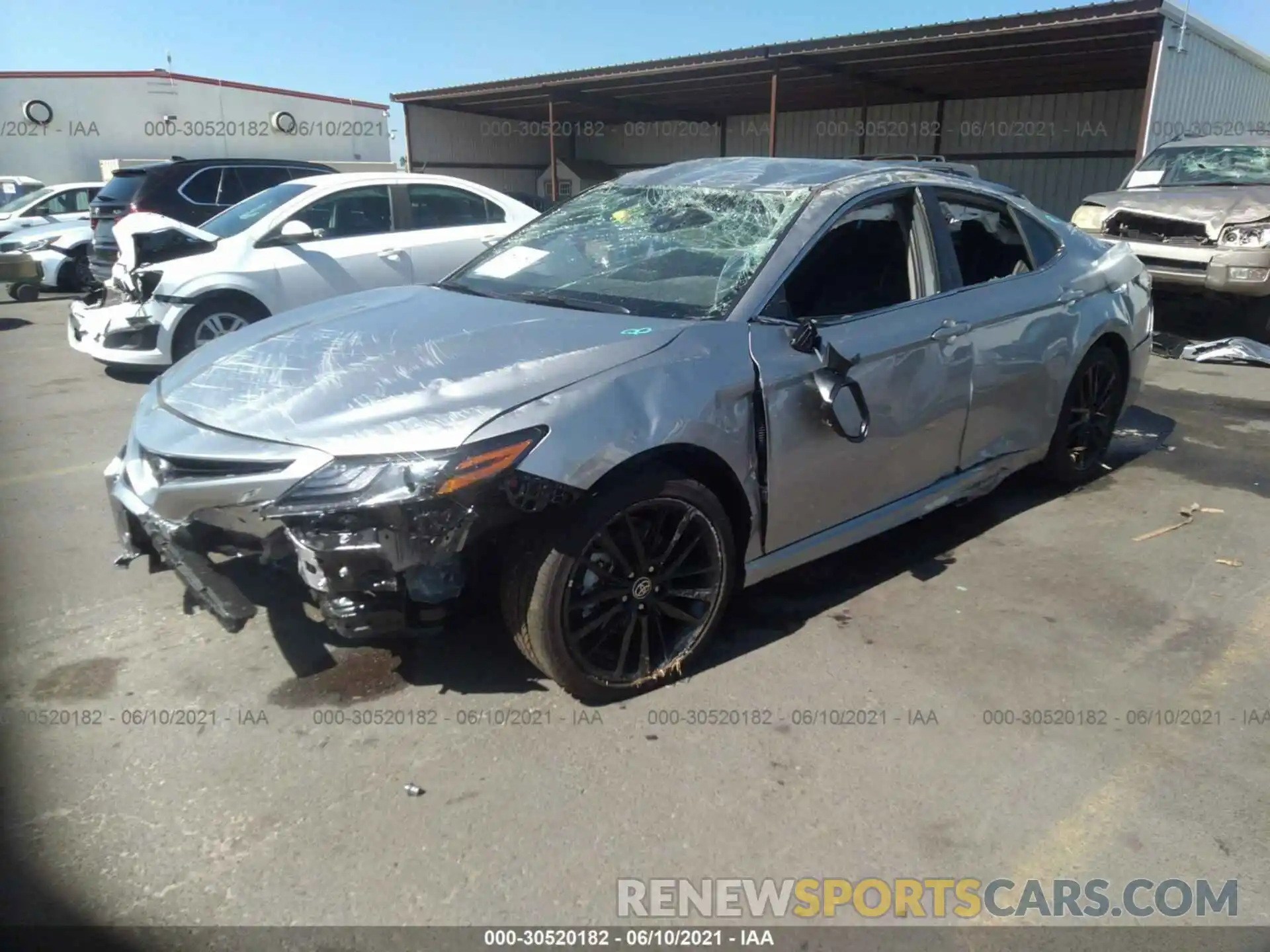 2 Photograph of a damaged car 4T1K61AK9MU572353 TOYOTA CAMRY 2021