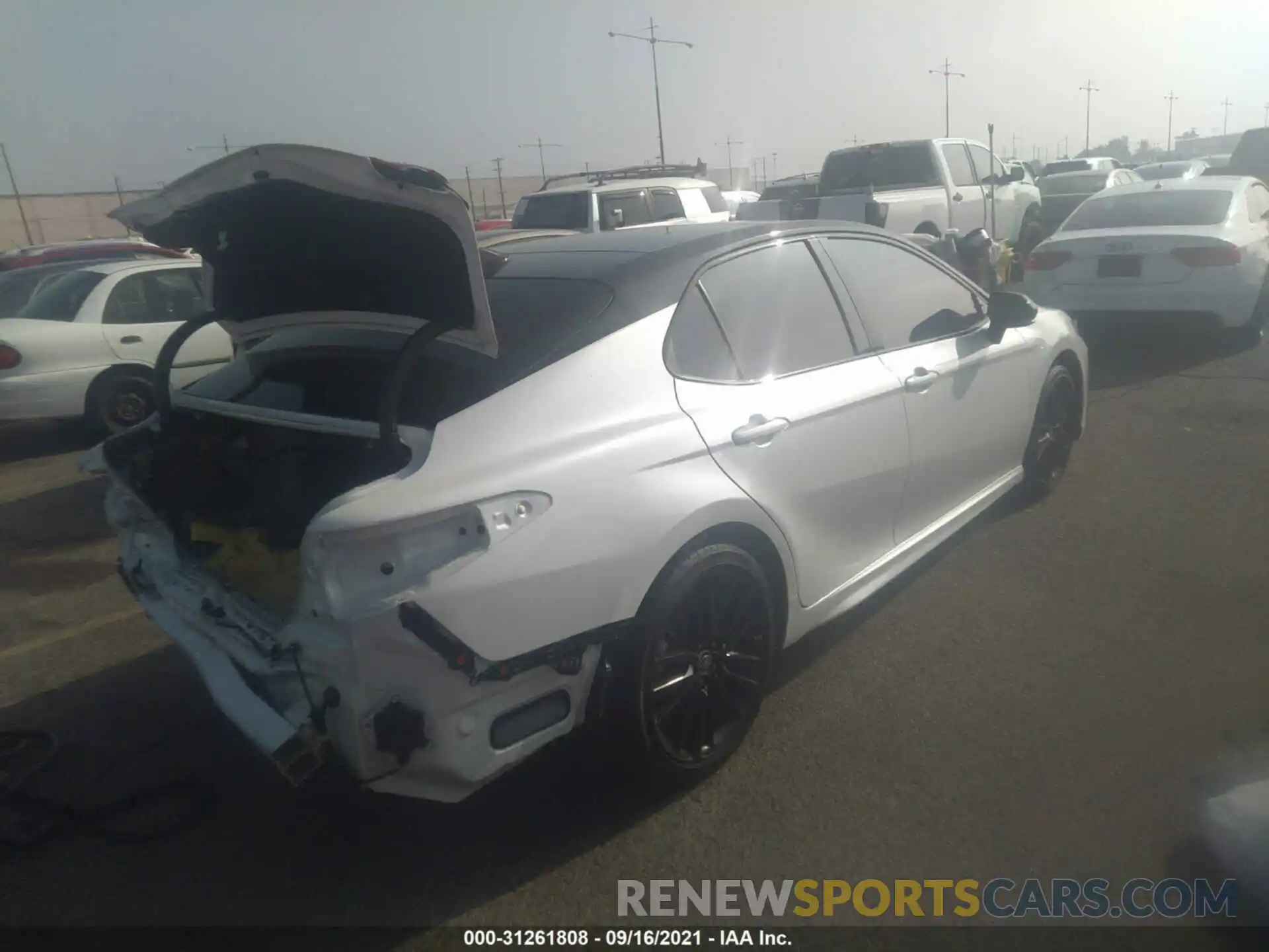 4 Photograph of a damaged car 4T1K61BK8MU027632 TOYOTA CAMRY 2021