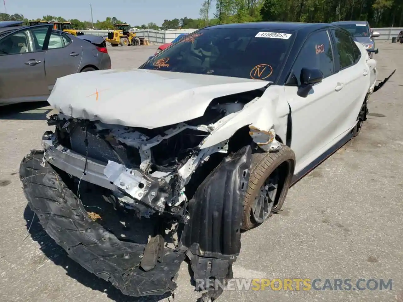 2 Photograph of a damaged car 4T1KZ1AK1MU057712 TOYOTA CAMRY 2021