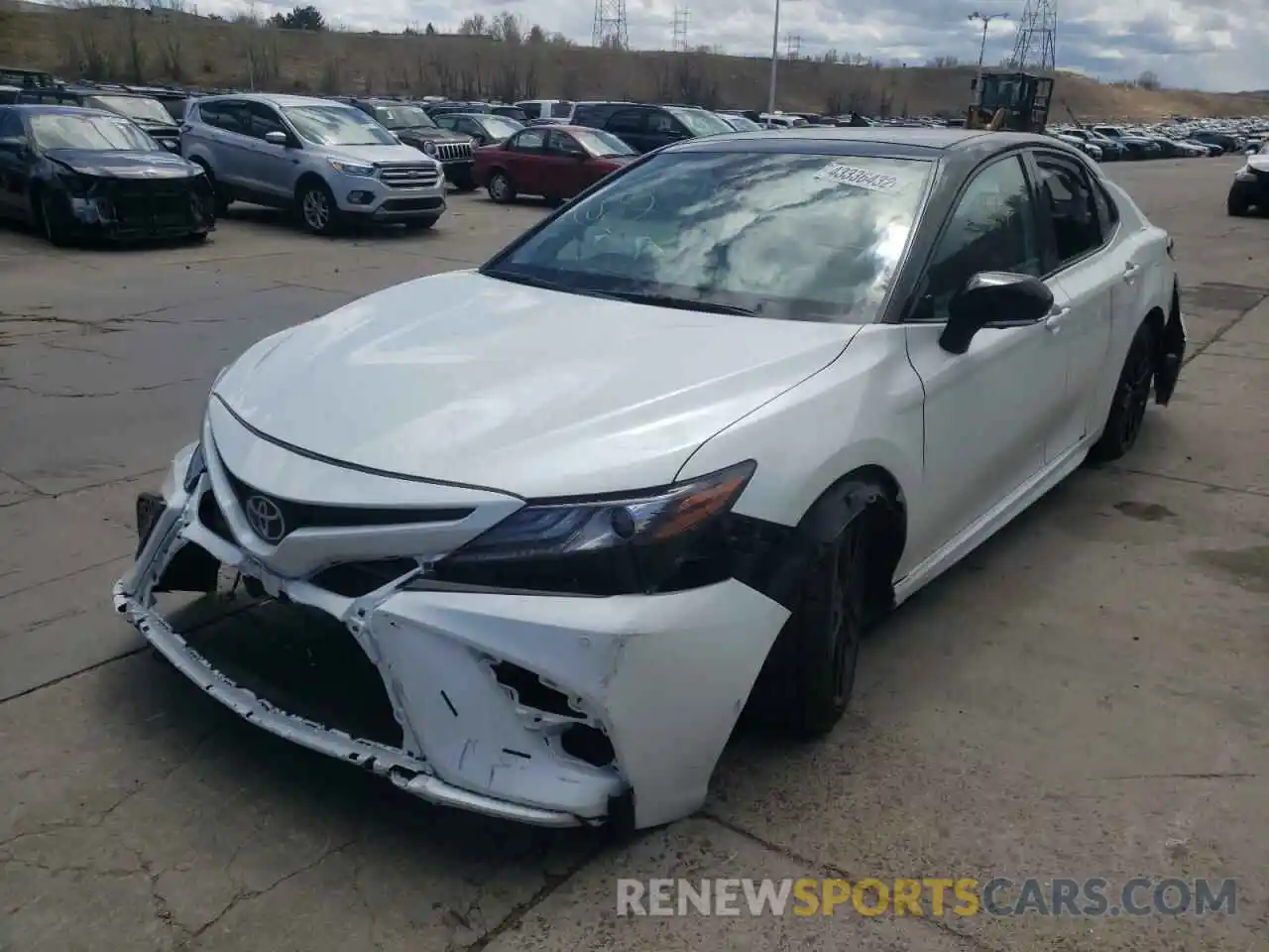 2 Photograph of a damaged car 4T1KZ1AK1MU060125 TOYOTA CAMRY 2021