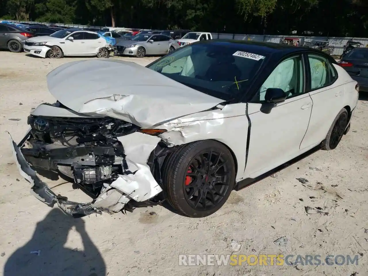 2 Photograph of a damaged car 4T1KZ1AK4MU057106 TOYOTA CAMRY 2021