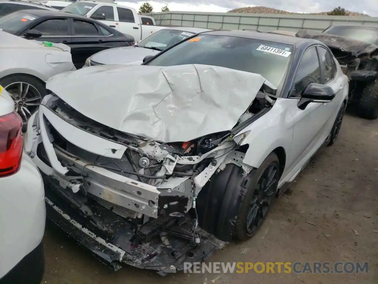 2 Photograph of a damaged car 4T1KZ1AKXMU054307 TOYOTA CAMRY 2021