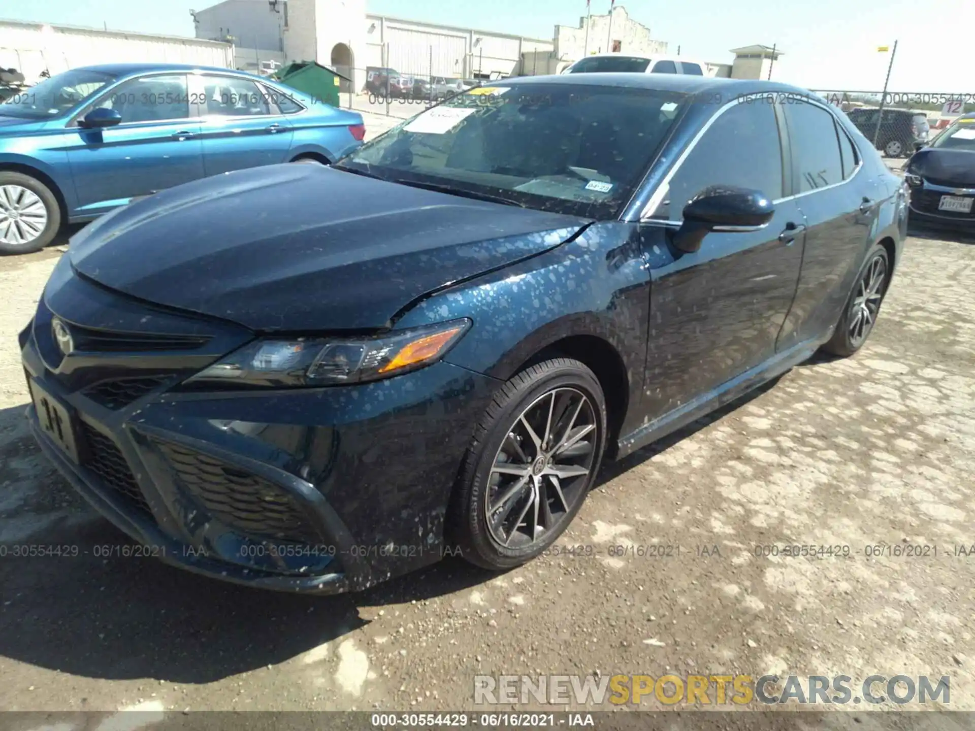 2 Photograph of a damaged car 4T1T11AK3MU574148 TOYOTA CAMRY 2021