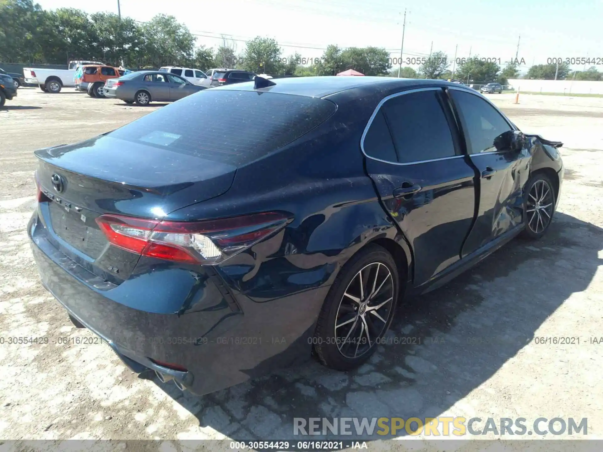 4 Photograph of a damaged car 4T1T11AK3MU574148 TOYOTA CAMRY 2021