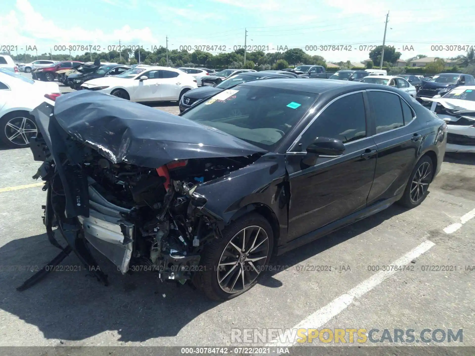 2 Photograph of a damaged car 4T1T11AKXMU402957 TOYOTA CAMRY 2021