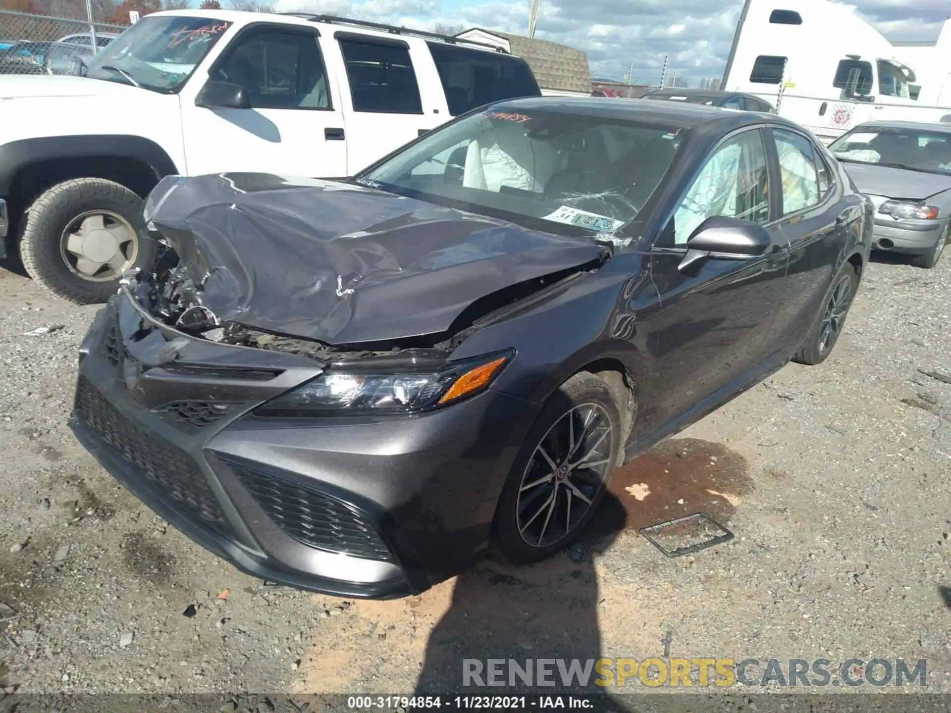 2 Photograph of a damaged car 4T1T11BKXMU028865 TOYOTA CAMRY 2021