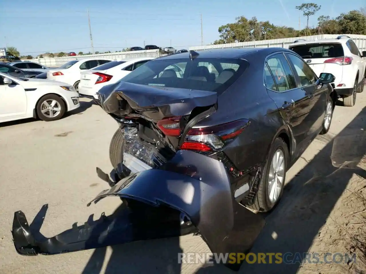 4 Photograph of a damaged car 4T1C11AK3NU656284 TOYOTA CAMRY 2022