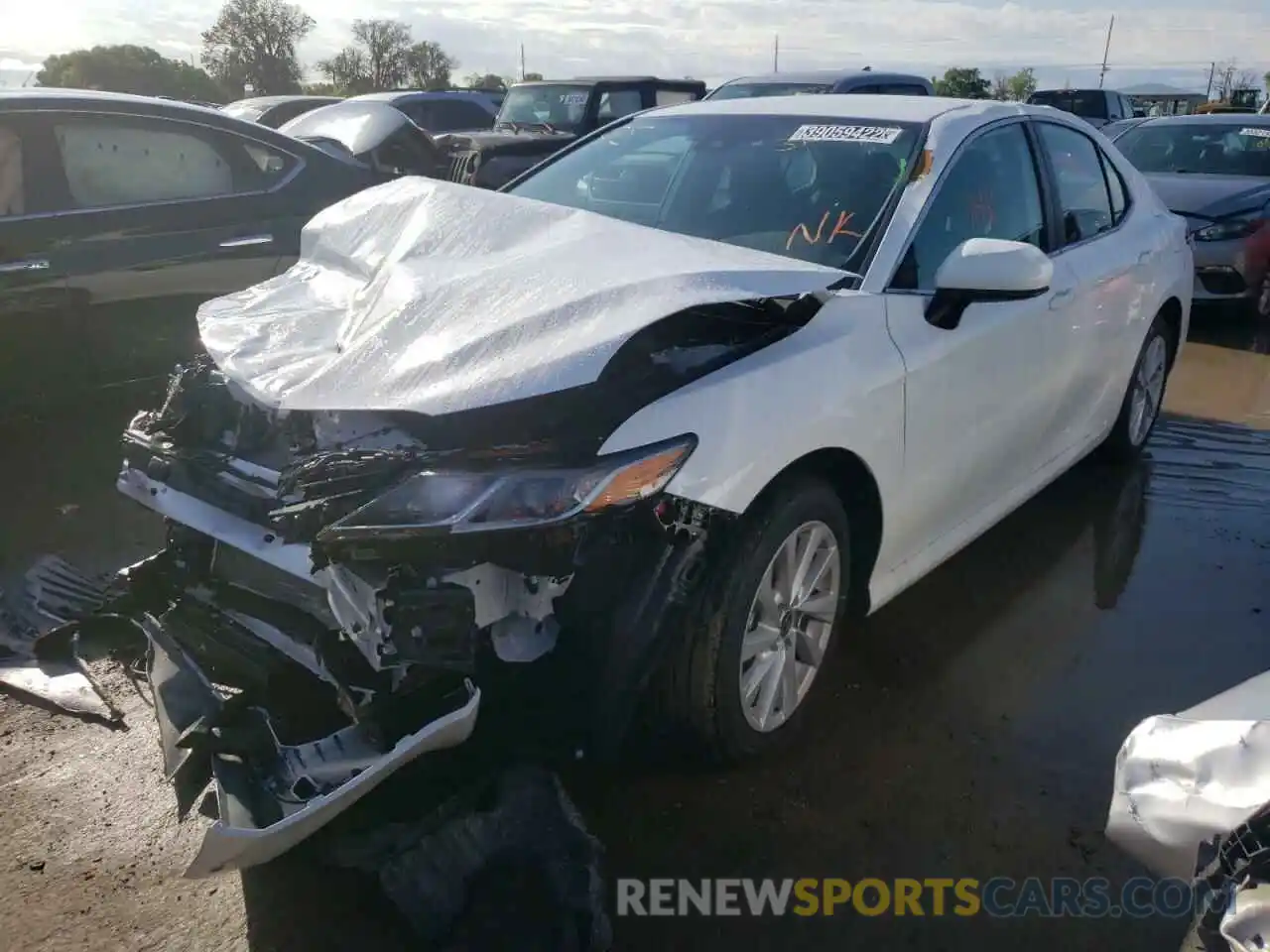 2 Photograph of a damaged car 4T1C11AK5NU665519 TOYOTA CAMRY 2022