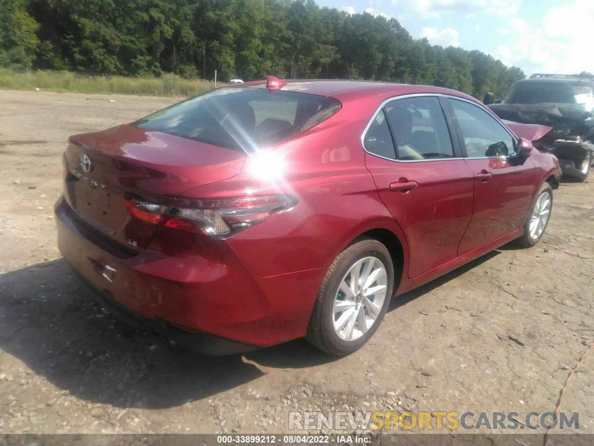 4 Photograph of a damaged car 4T1C11AK6NU697198 TOYOTA CAMRY 2022