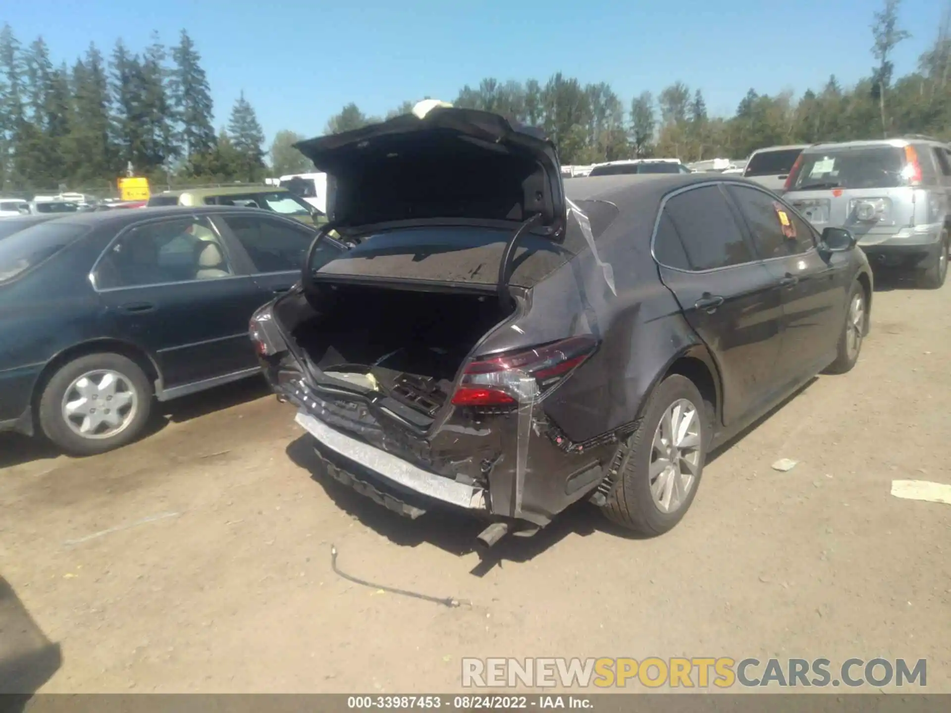 4 Photograph of a damaged car 4T1C11AK7NU019446 TOYOTA CAMRY 2022