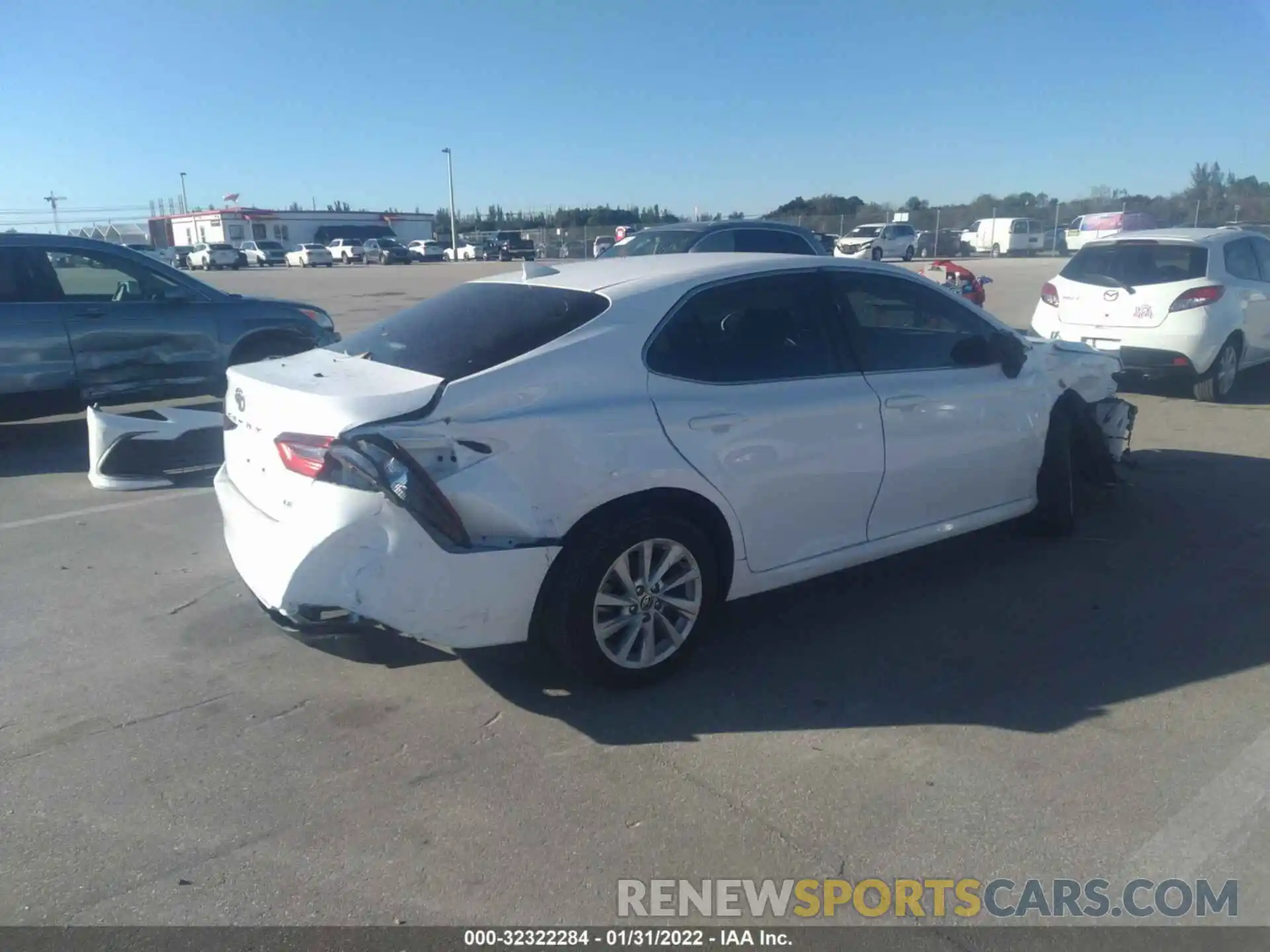 4 Photograph of a damaged car 4T1C11AK7NU627824 TOYOTA CAMRY 2022