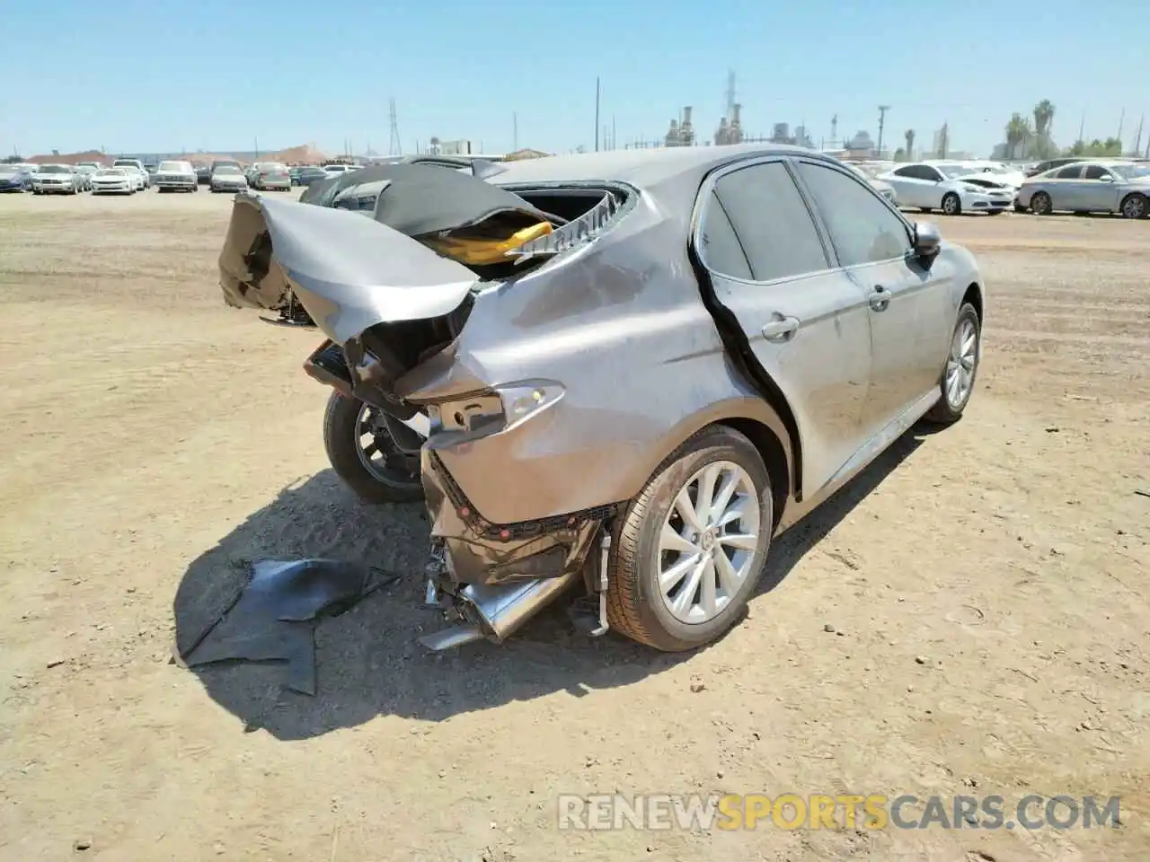 4 Photograph of a damaged car 4T1C11AK9NU658671 TOYOTA CAMRY 2022