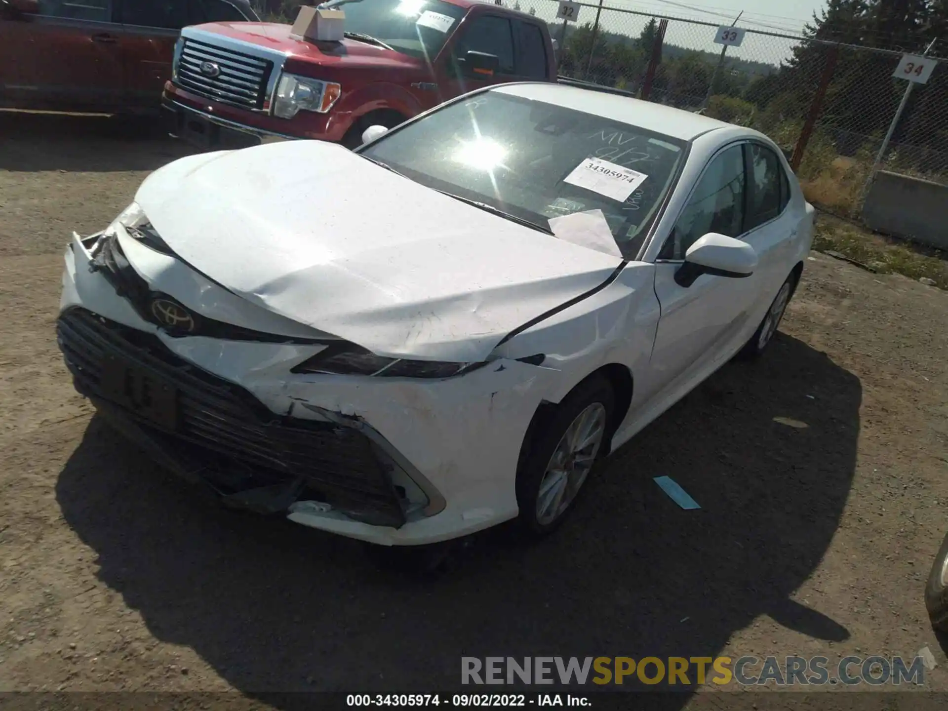 2 Photograph of a damaged car 4T1C11AK9NU699740 TOYOTA CAMRY 2022