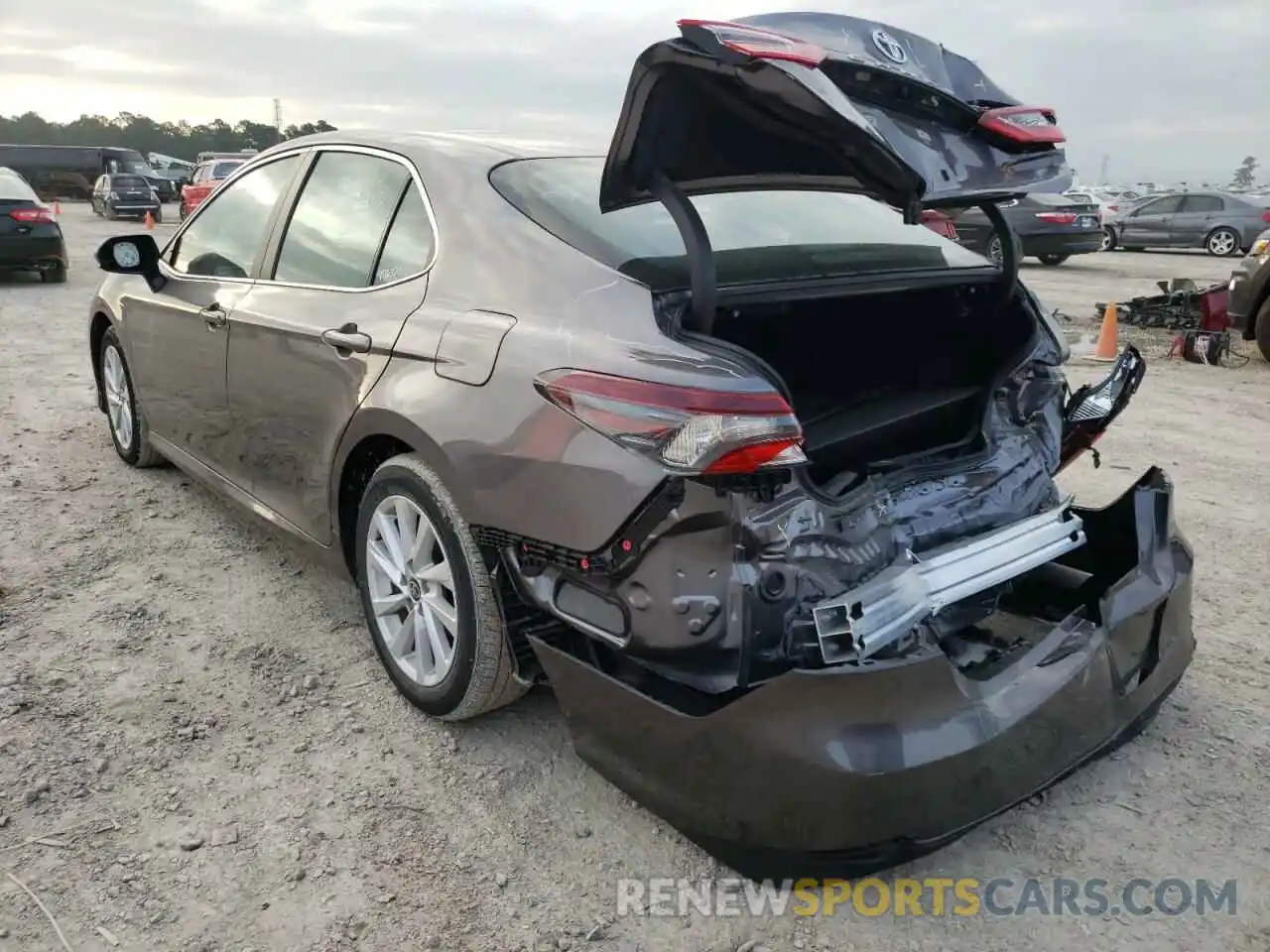 3 Photograph of a damaged car 4T1C11AKXNU636064 TOYOTA CAMRY 2022