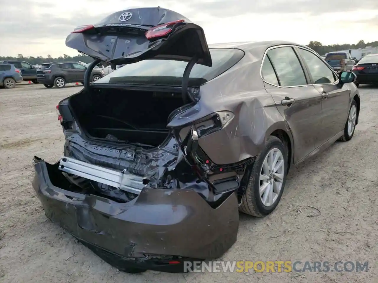 4 Photograph of a damaged car 4T1C11AKXNU636064 TOYOTA CAMRY 2022