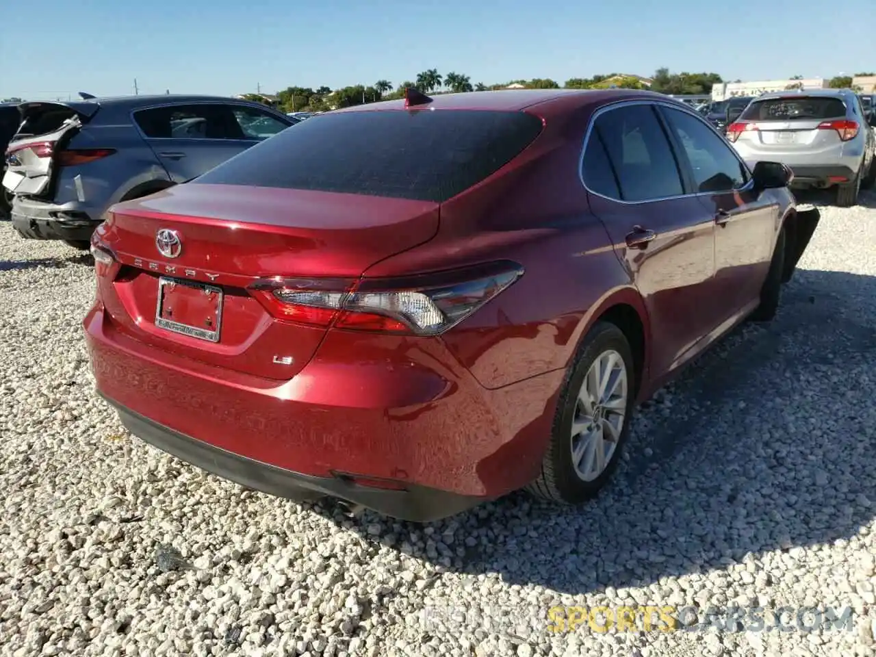 4 Photograph of a damaged car 4T1C11AKXNU646500 TOYOTA CAMRY 2022