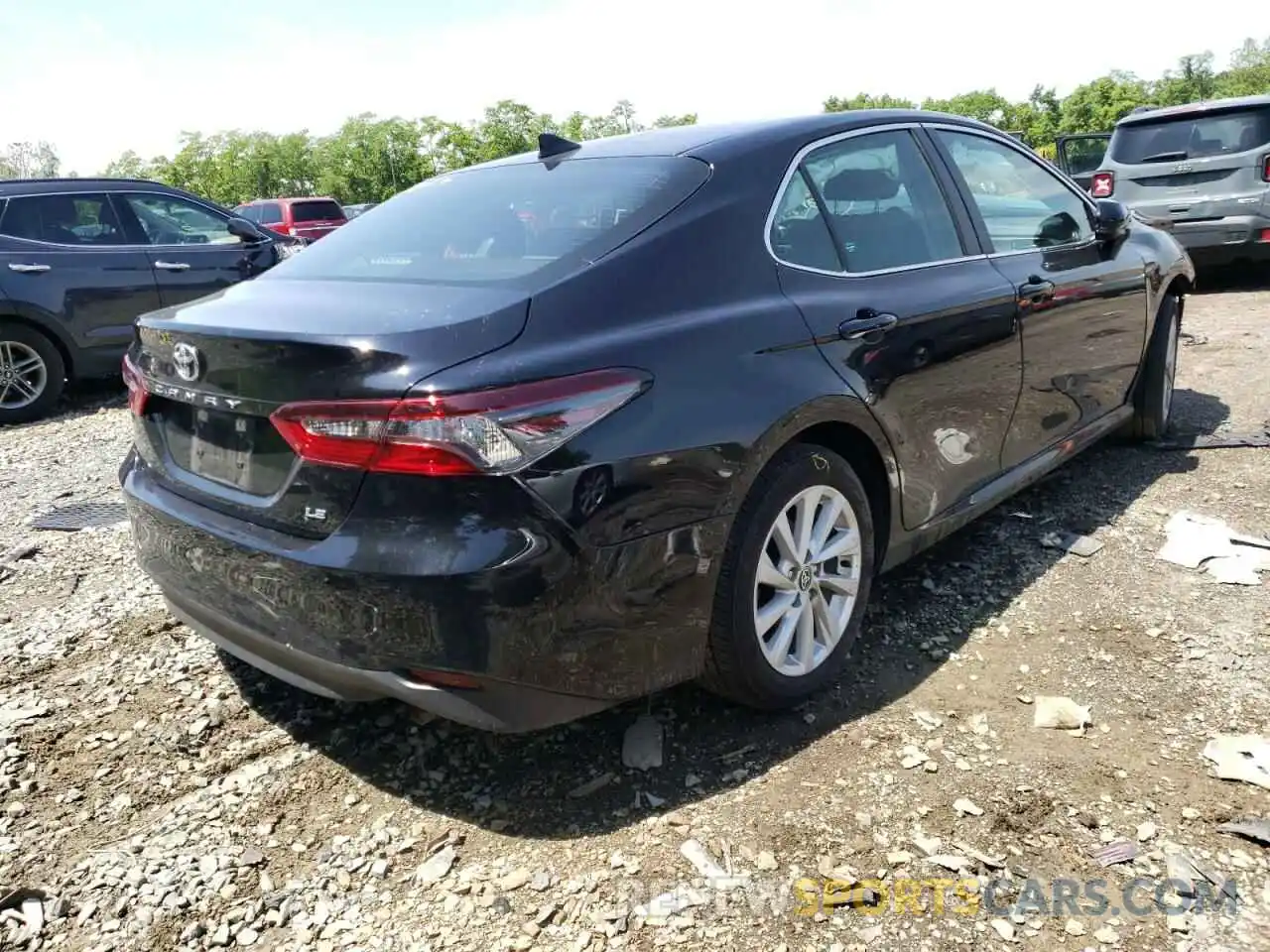 4 Photograph of a damaged car 4T1C11AKXNU651986 TOYOTA CAMRY 2022