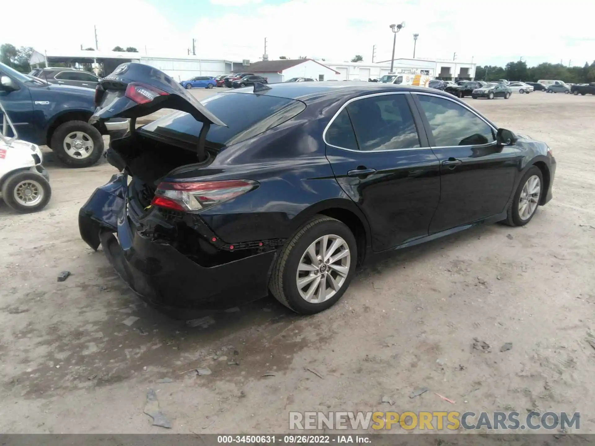 4 Photograph of a damaged car 4T1C11AKXNU660882 TOYOTA CAMRY 2022