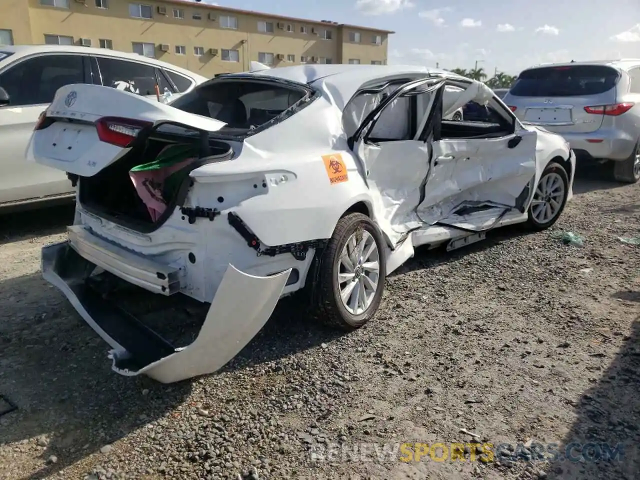 4 Photograph of a damaged car 4T1C11AKXNU666892 TOYOTA CAMRY 2022