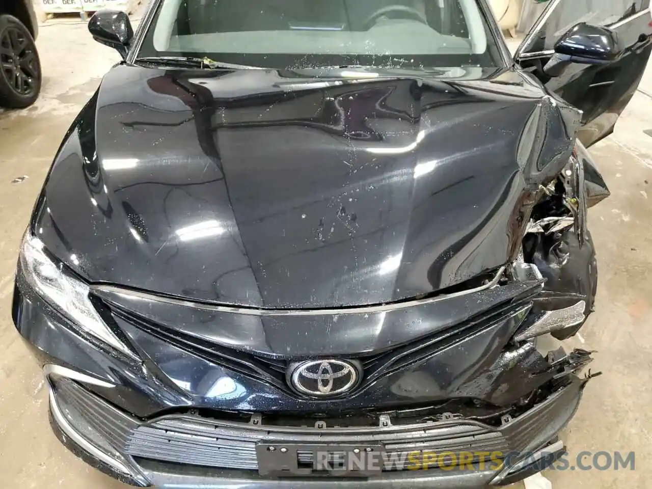 11 Photograph of a damaged car 4T1C11AKXNU687659 TOYOTA CAMRY 2022