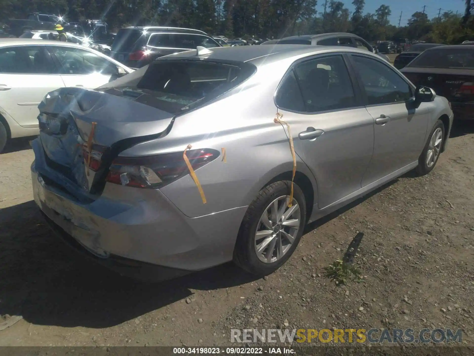 4 Photograph of a damaged car 4T1C11BK5NU072273 TOYOTA CAMRY 2022