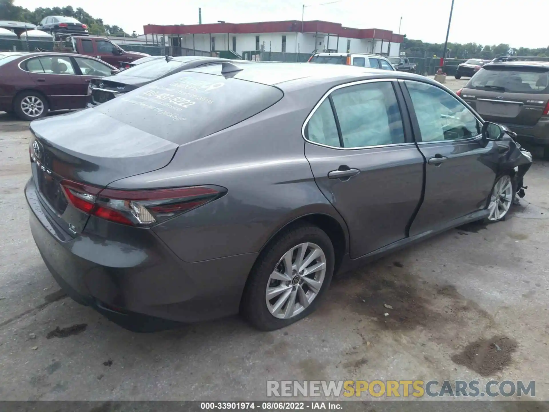 4 Photograph of a damaged car 4T1C11BKXNU054738 TOYOTA CAMRY 2022