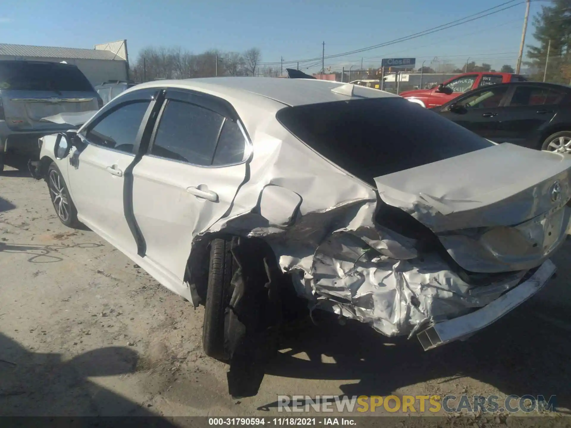 3 Photograph of a damaged car 4T1G11AK2NU001146 TOYOTA CAMRY 2022