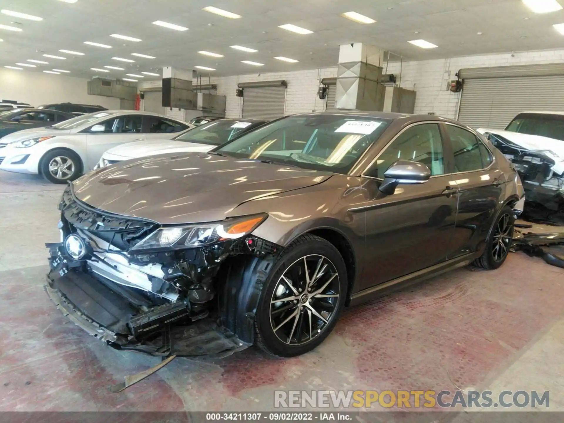 2 Photograph of a damaged car 4T1G11AK2NU661252 TOYOTA CAMRY 2022