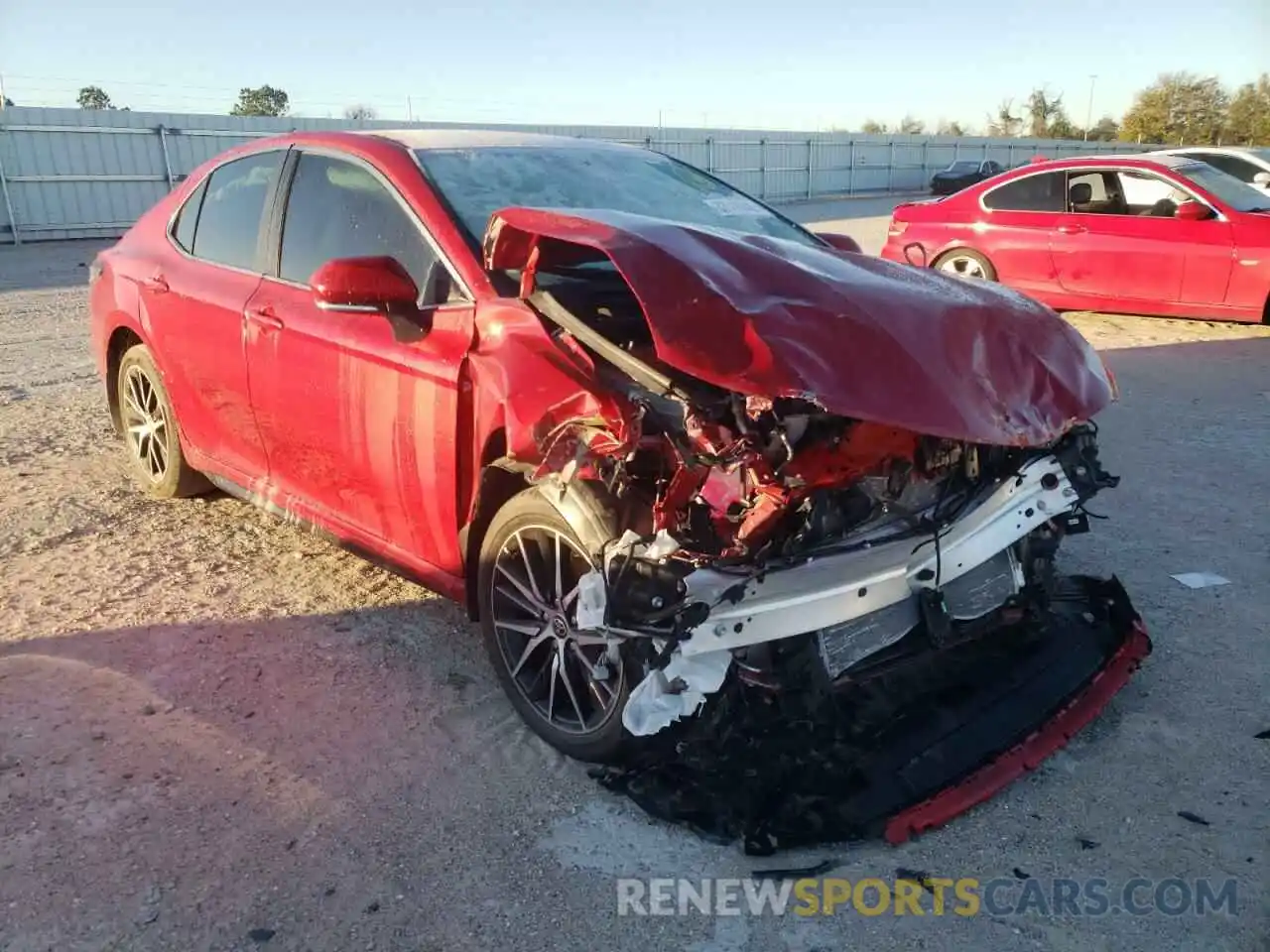 1 Photograph of a damaged car 4T1G11AKXNU015621 TOYOTA CAMRY 2022