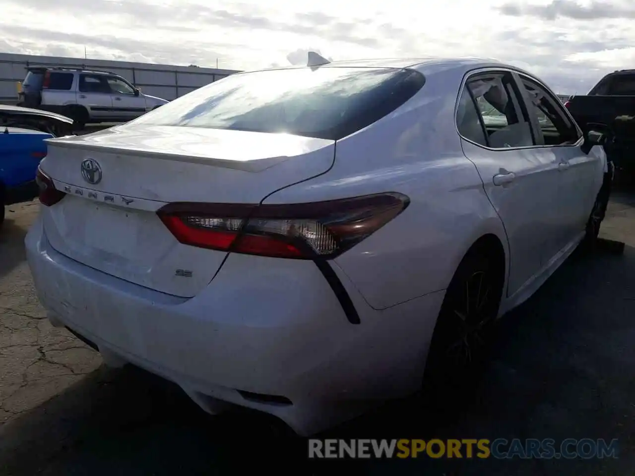 4 Photograph of a damaged car 4T1G11AKXNU623414 TOYOTA CAMRY 2022