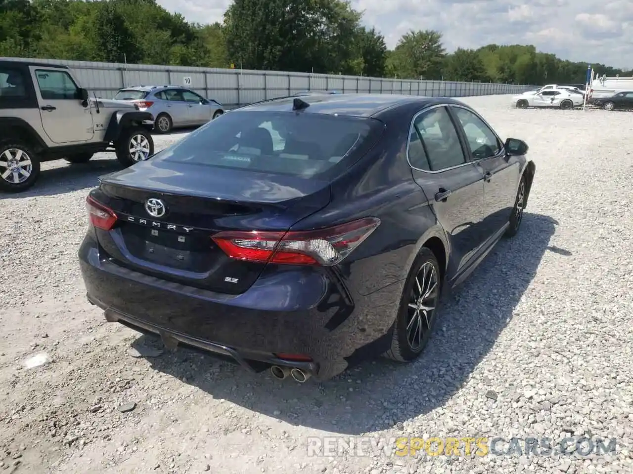 4 Photograph of a damaged car 4T1G11AKXNU628659 TOYOTA CAMRY 2022