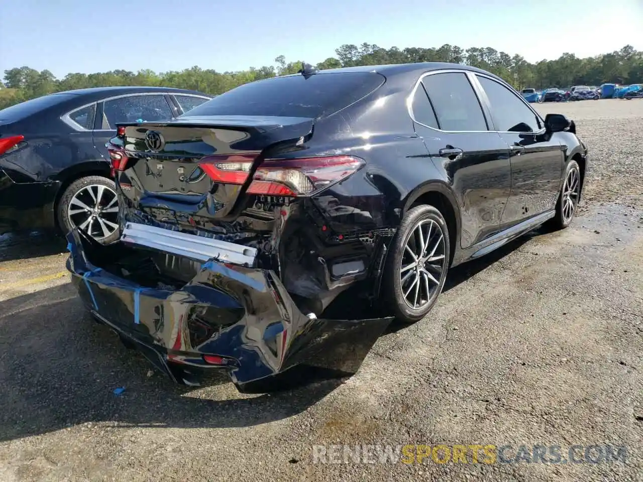 4 Photograph of a damaged car 4T1G11AKXNU651004 TOYOTA CAMRY 2022