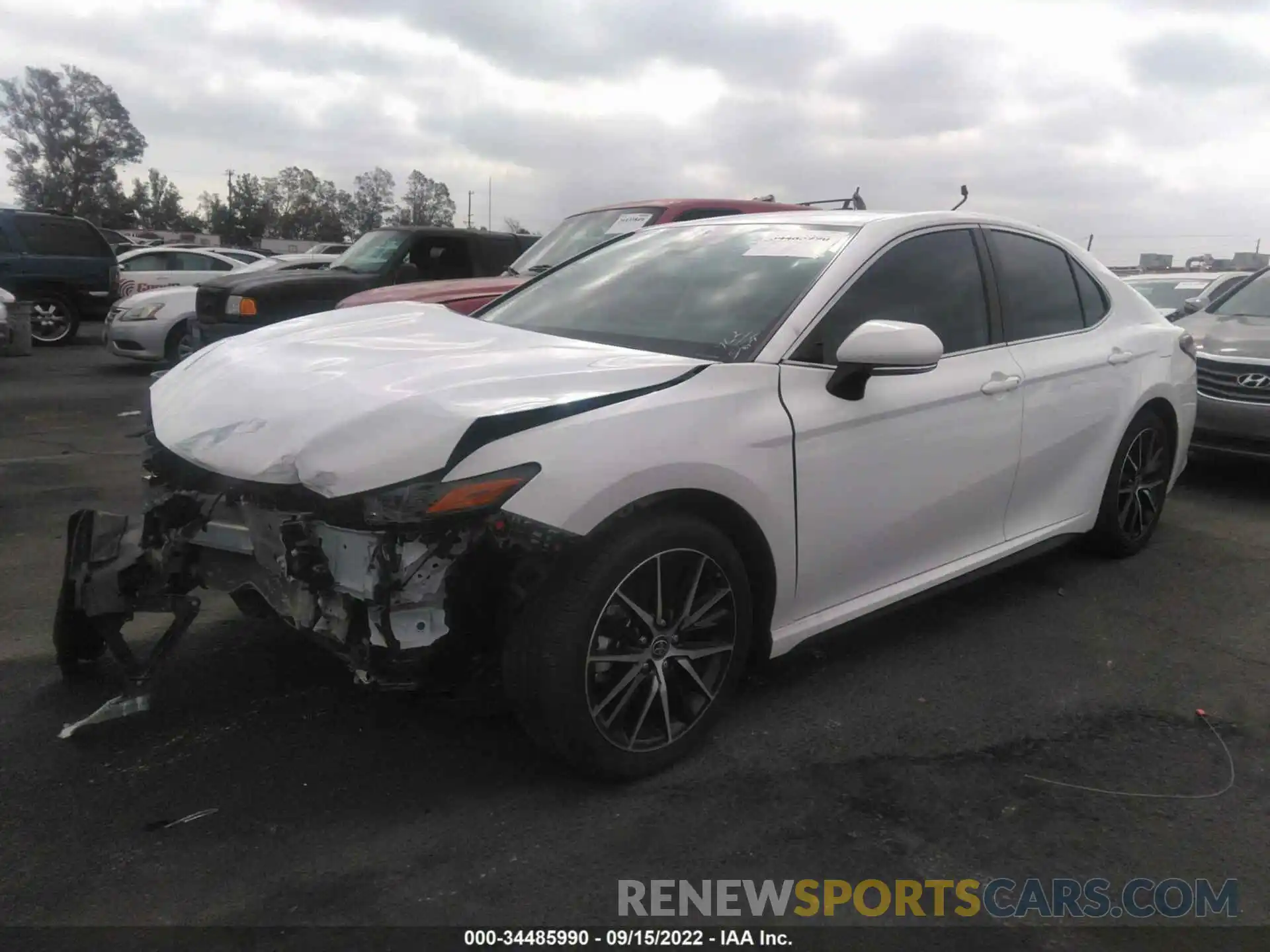 2 Photograph of a damaged car 4T1G11AKXNU657353 TOYOTA CAMRY 2022