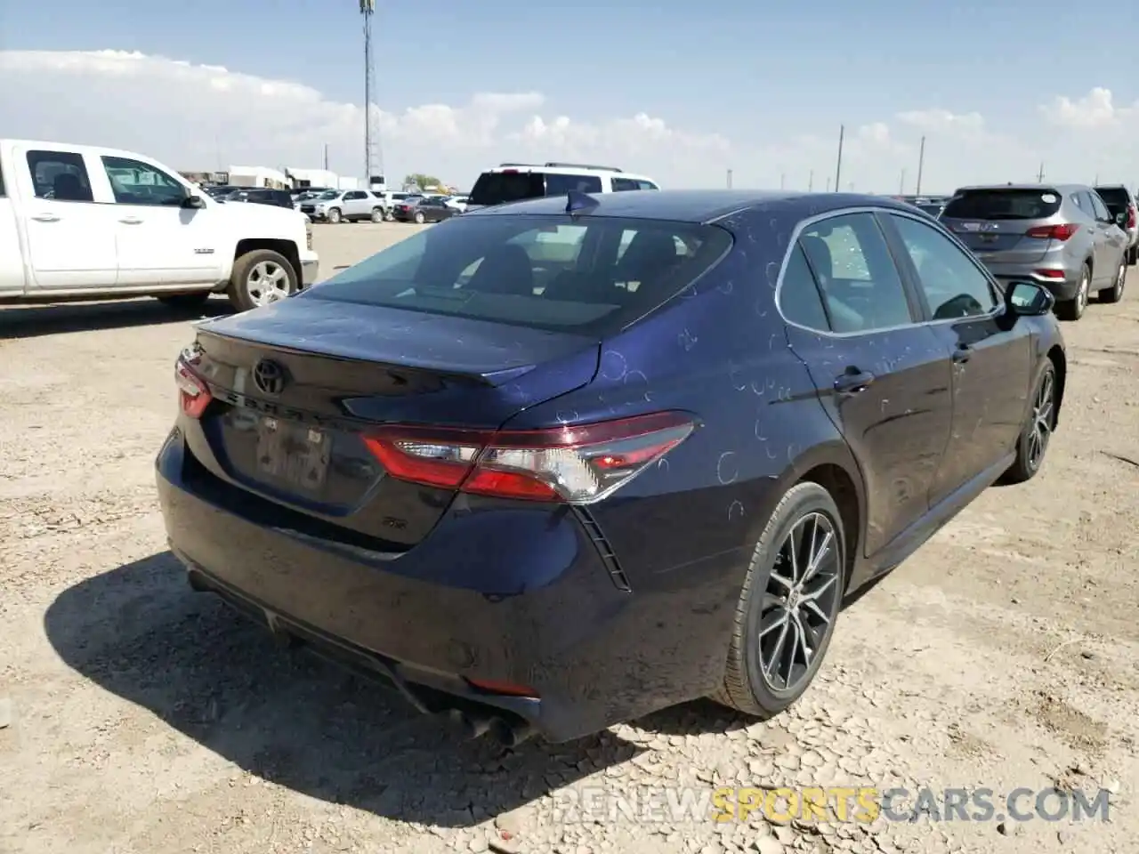 4 Photograph of a damaged car 4T1G11AKXNU657854 TOYOTA CAMRY 2022