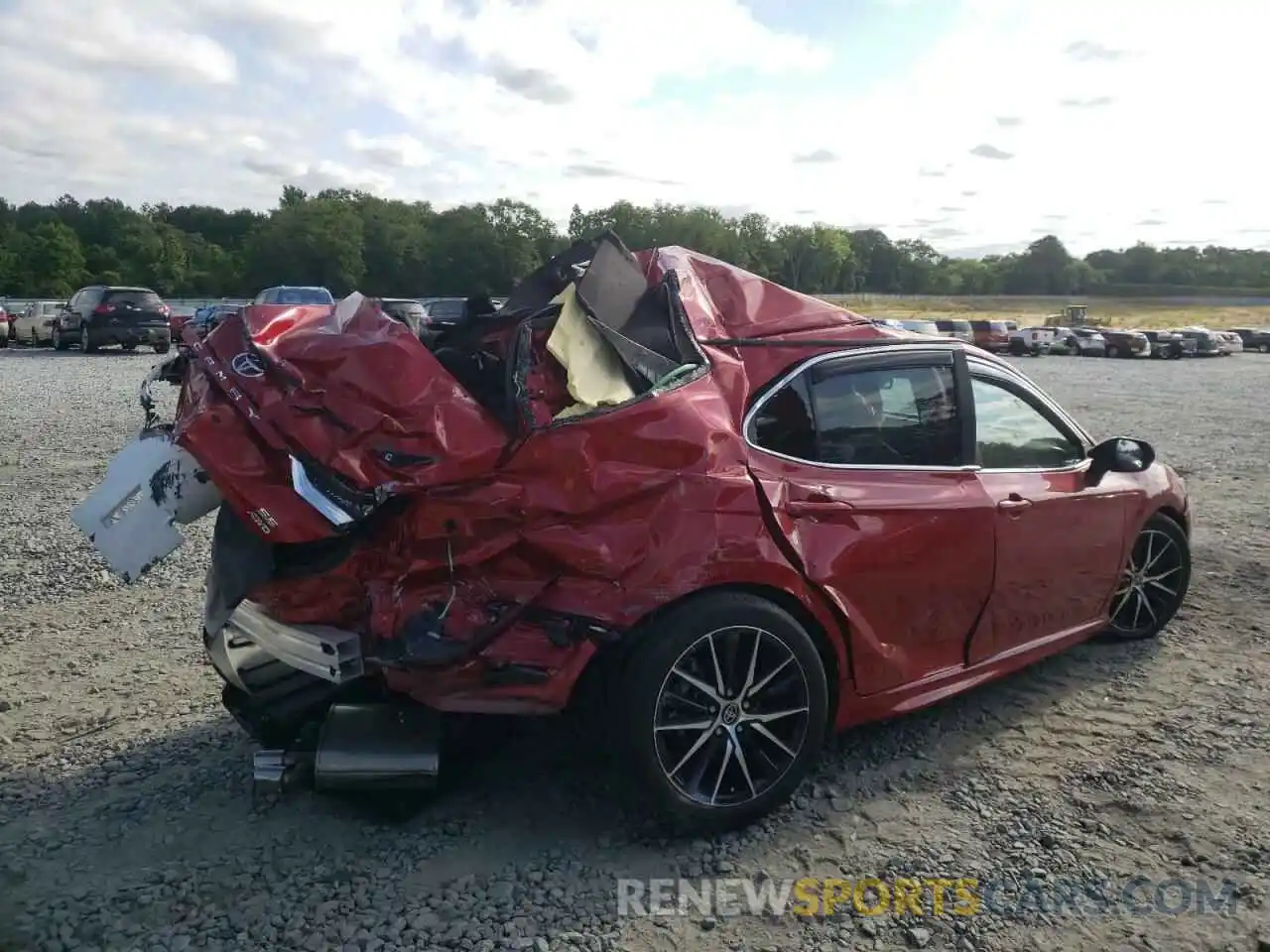 4 Photograph of a damaged car 4T1G11BK4NU056468 TOYOTA CAMRY 2022