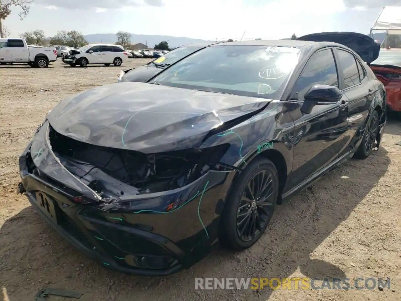 2 Photograph of a damaged car 4T1G31AK1NU034861 TOYOTA CAMRY 2022