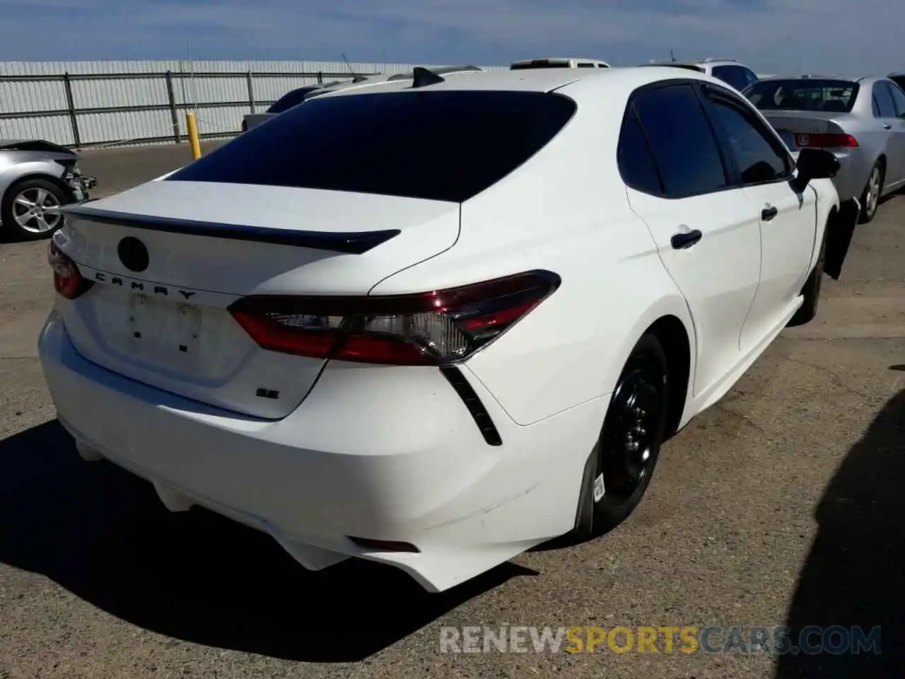 4 Photograph of a damaged car 4T1G31AKXNU033692 TOYOTA CAMRY 2022