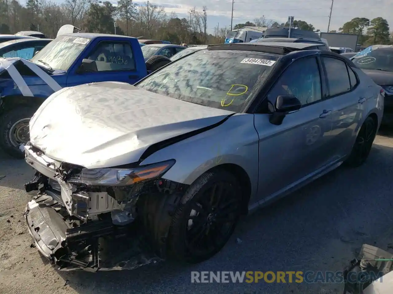 2 Photograph of a damaged car 4T1KZ1AK0NU063907 TOYOTA CAMRY 2022