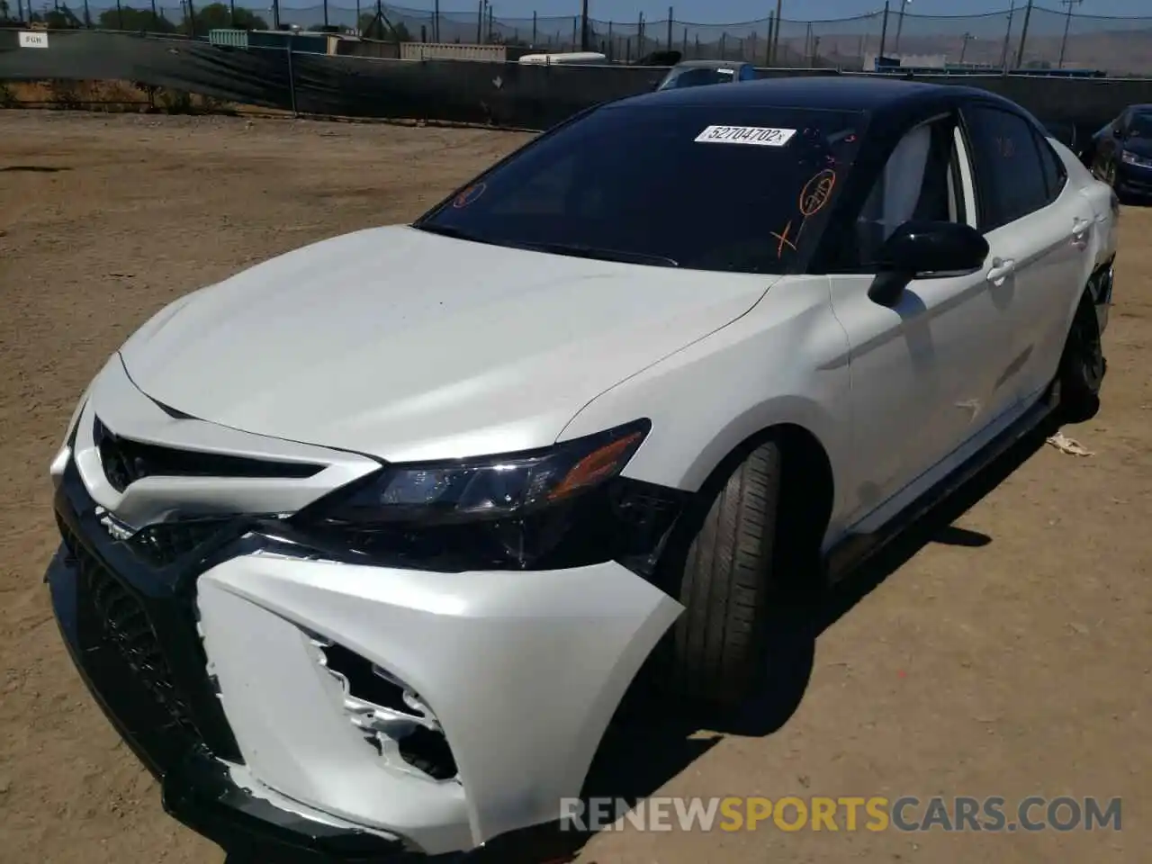 2 Photograph of a damaged car 4T1KZ1AKXNU067060 TOYOTA CAMRY 2022