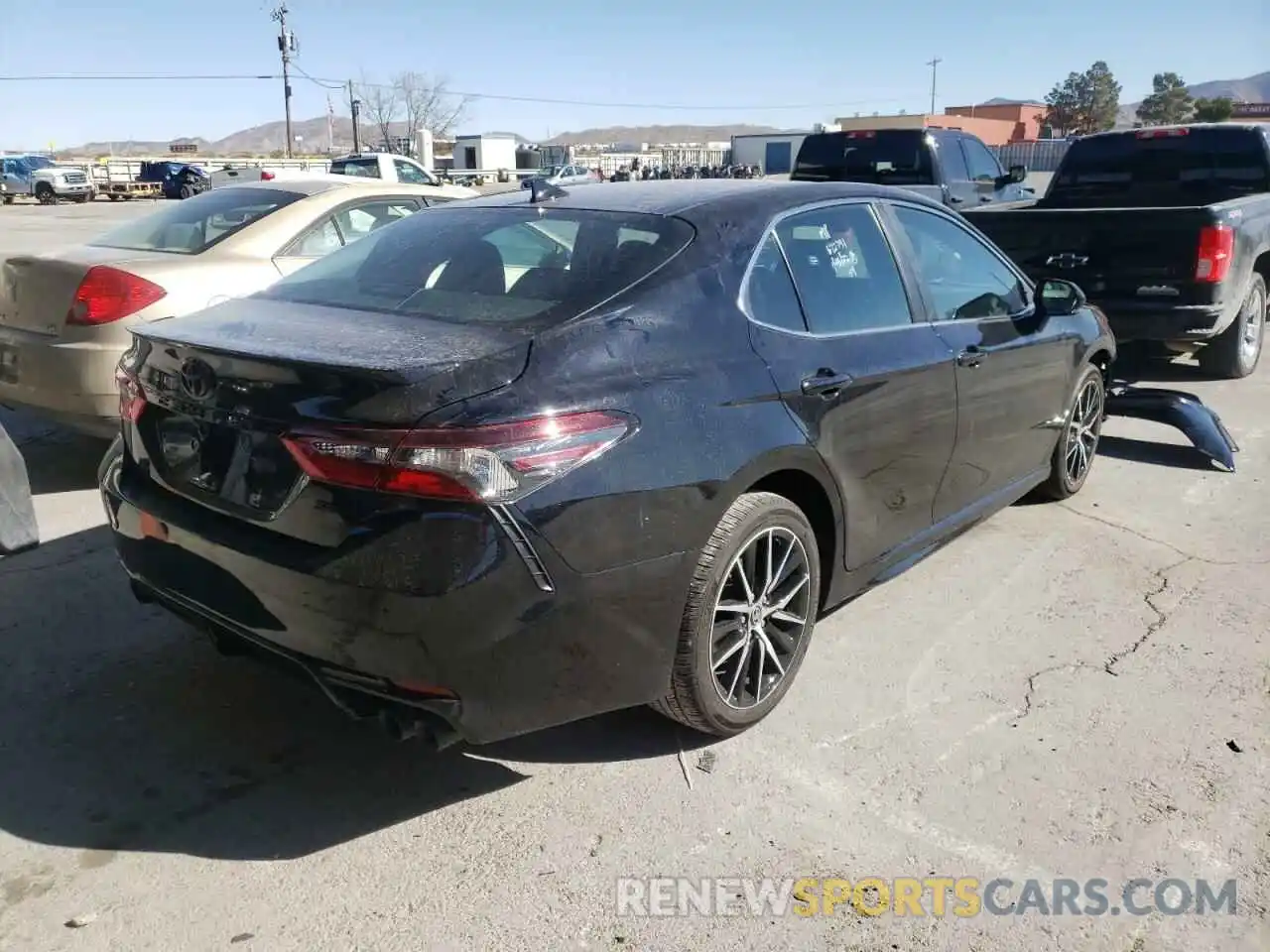 4 Photograph of a damaged car 4T1T11AK1NU618908 TOYOTA CAMRY 2022