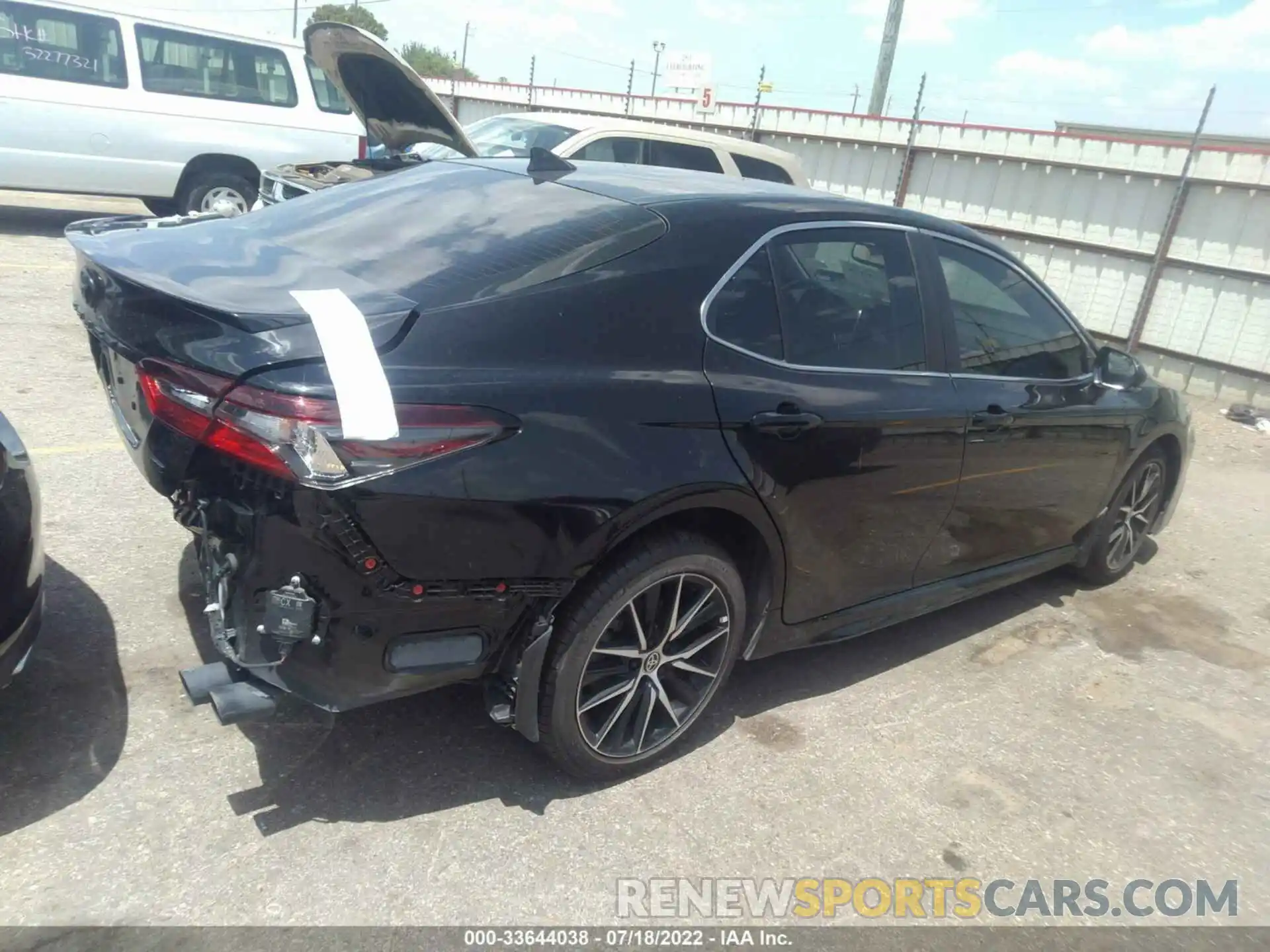 4 Photograph of a damaged car 4T1T11AK2NU623440 TOYOTA CAMRY 2022