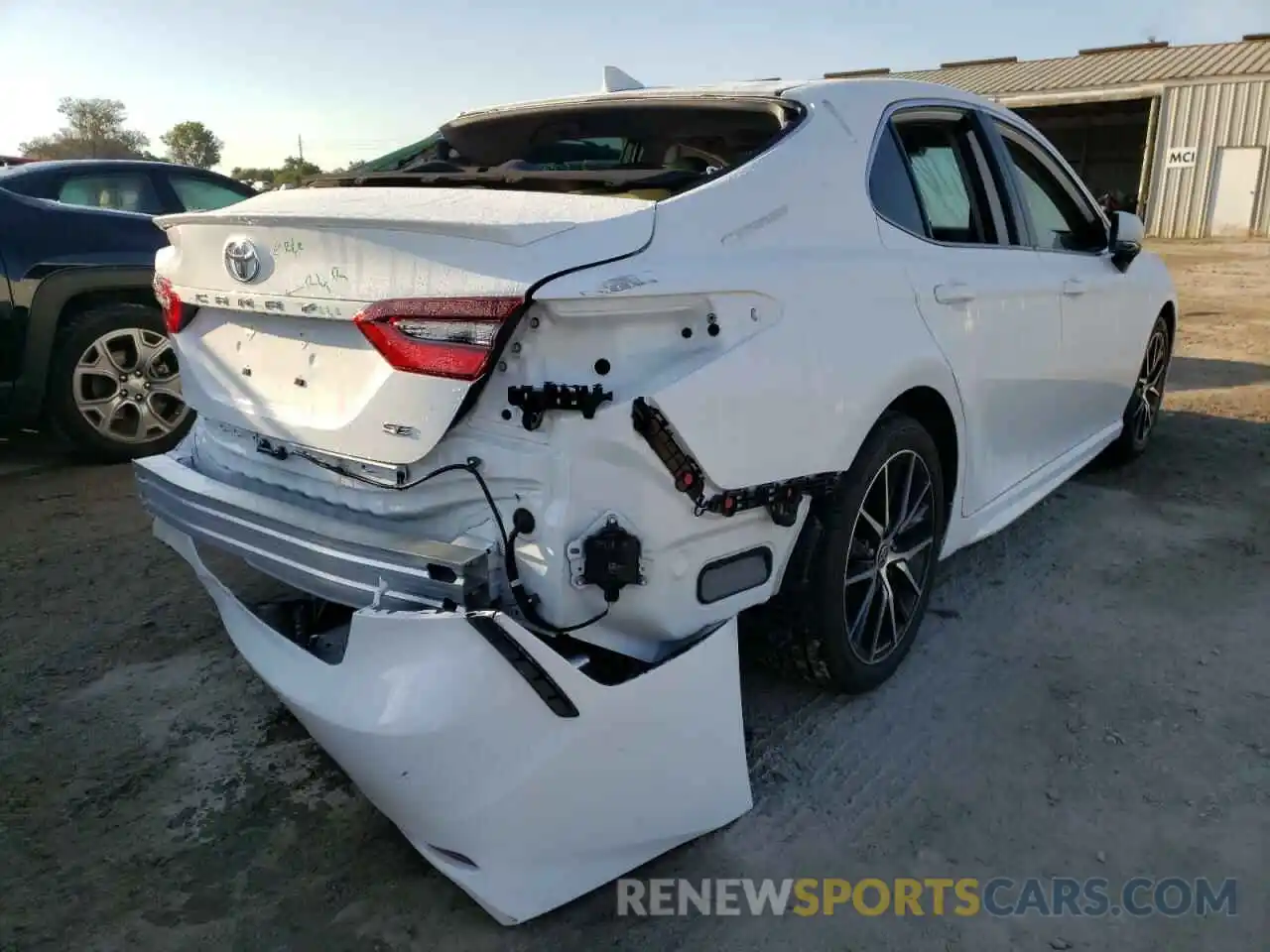 4 Photograph of a damaged car 4T1T11AK7NU637527 TOYOTA CAMRY 2022