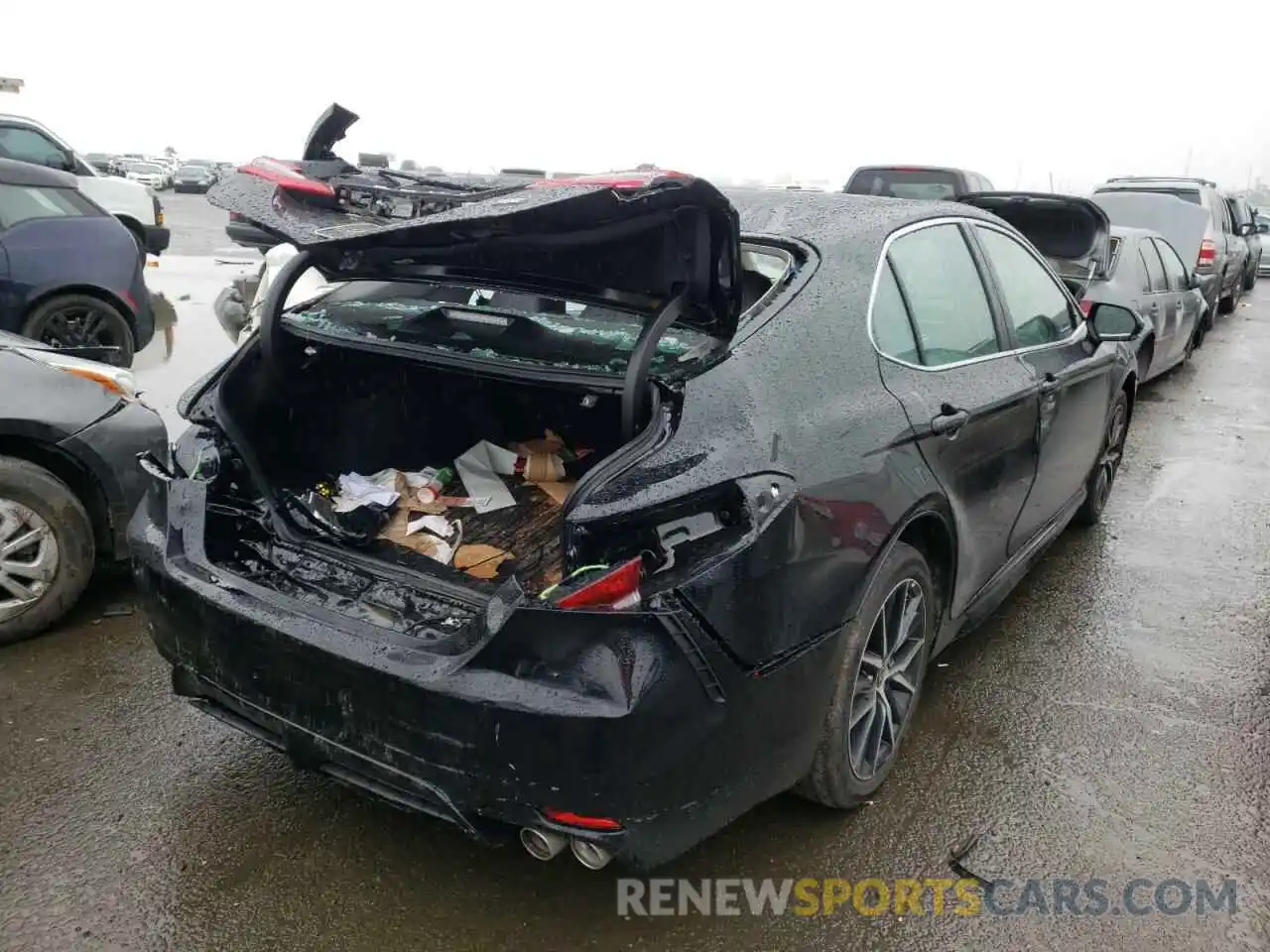 4 Photograph of a damaged car 4T1T11AKXNU642608 TOYOTA CAMRY 2022