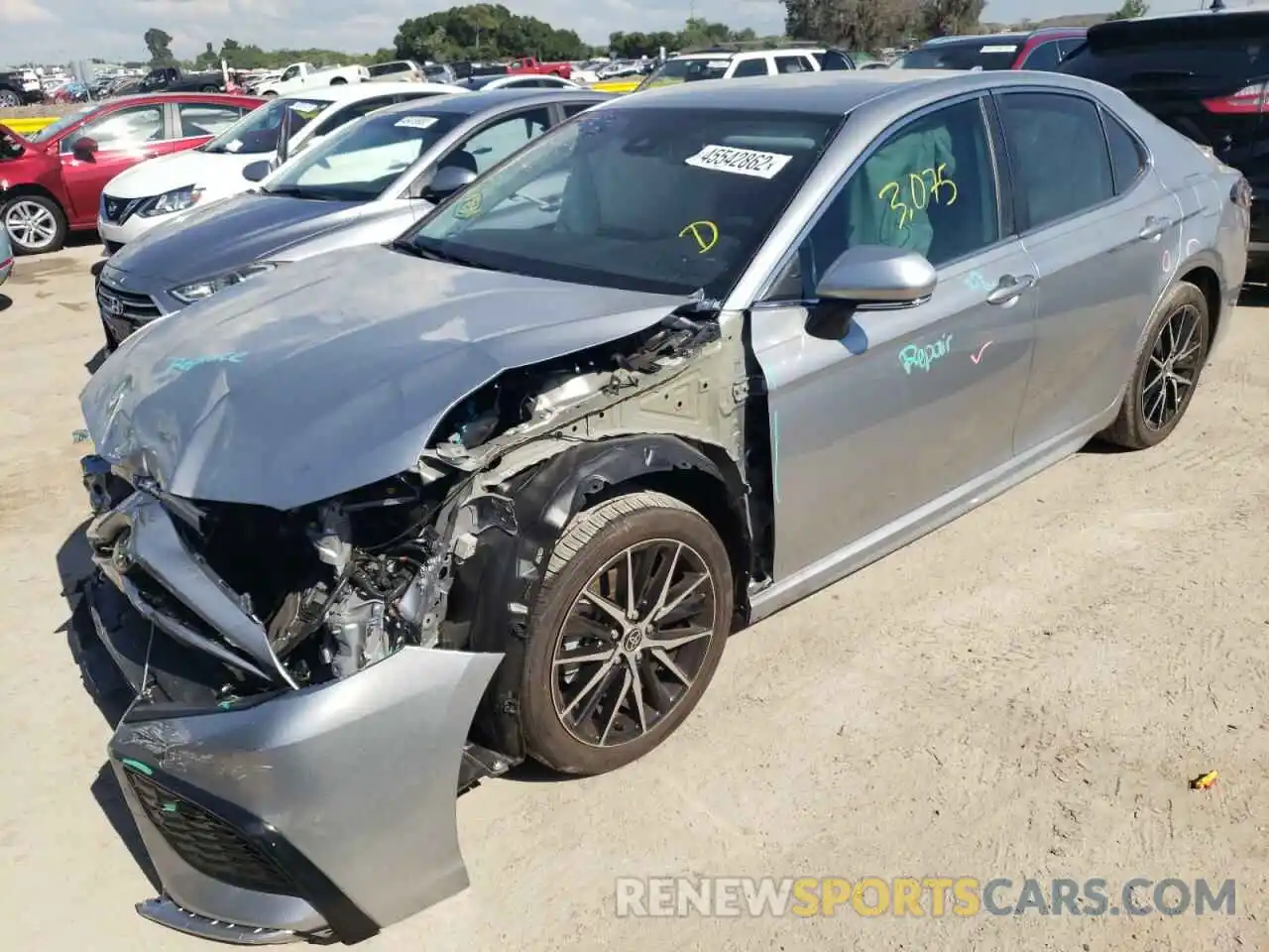 2 Photograph of a damaged car 4T1T11AKXNU669811 TOYOTA CAMRY 2022