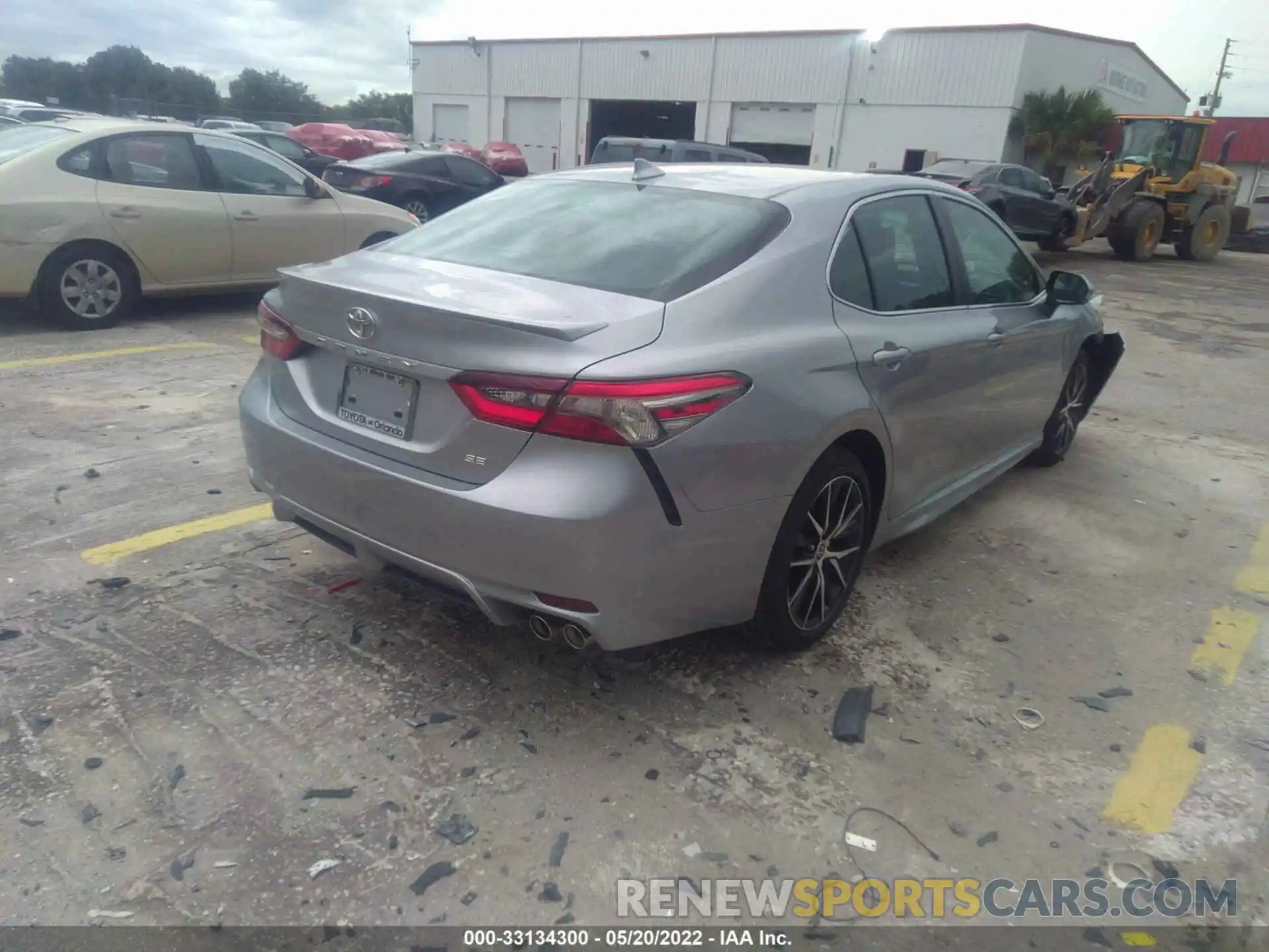 4 Photograph of a damaged car 4T1T11AKXNU676435 TOYOTA CAMRY 2022