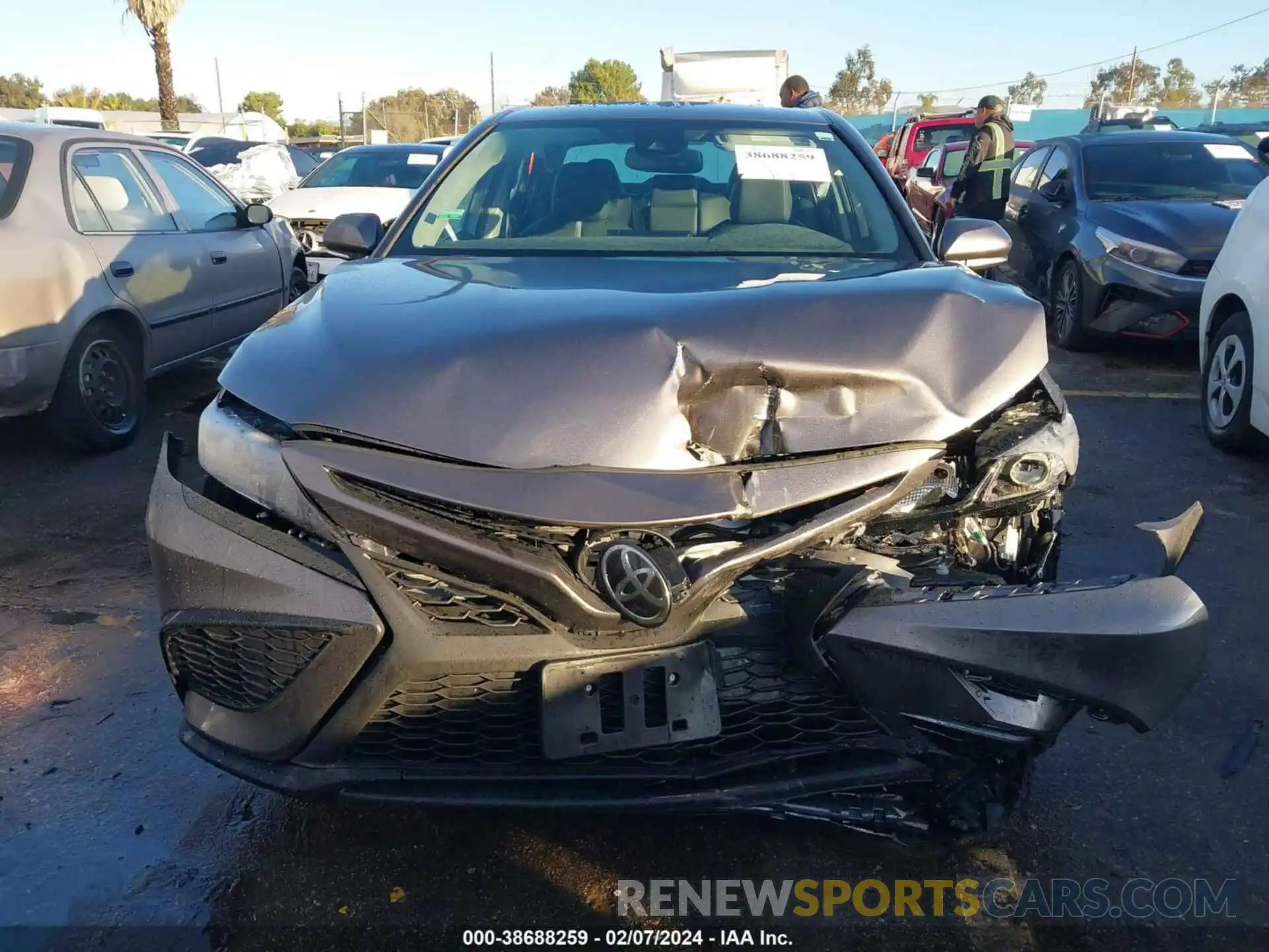 12 Photograph of a damaged car 4T1T11AKXNU676628 TOYOTA CAMRY 2022