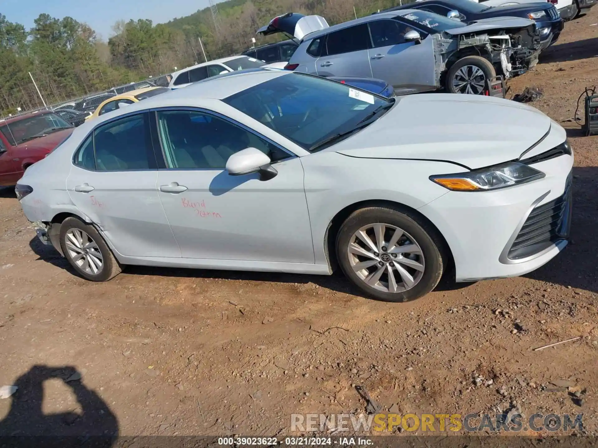 13 Photograph of a damaged car 4T1C11AK2PU090525 TOYOTA CAMRY 2023