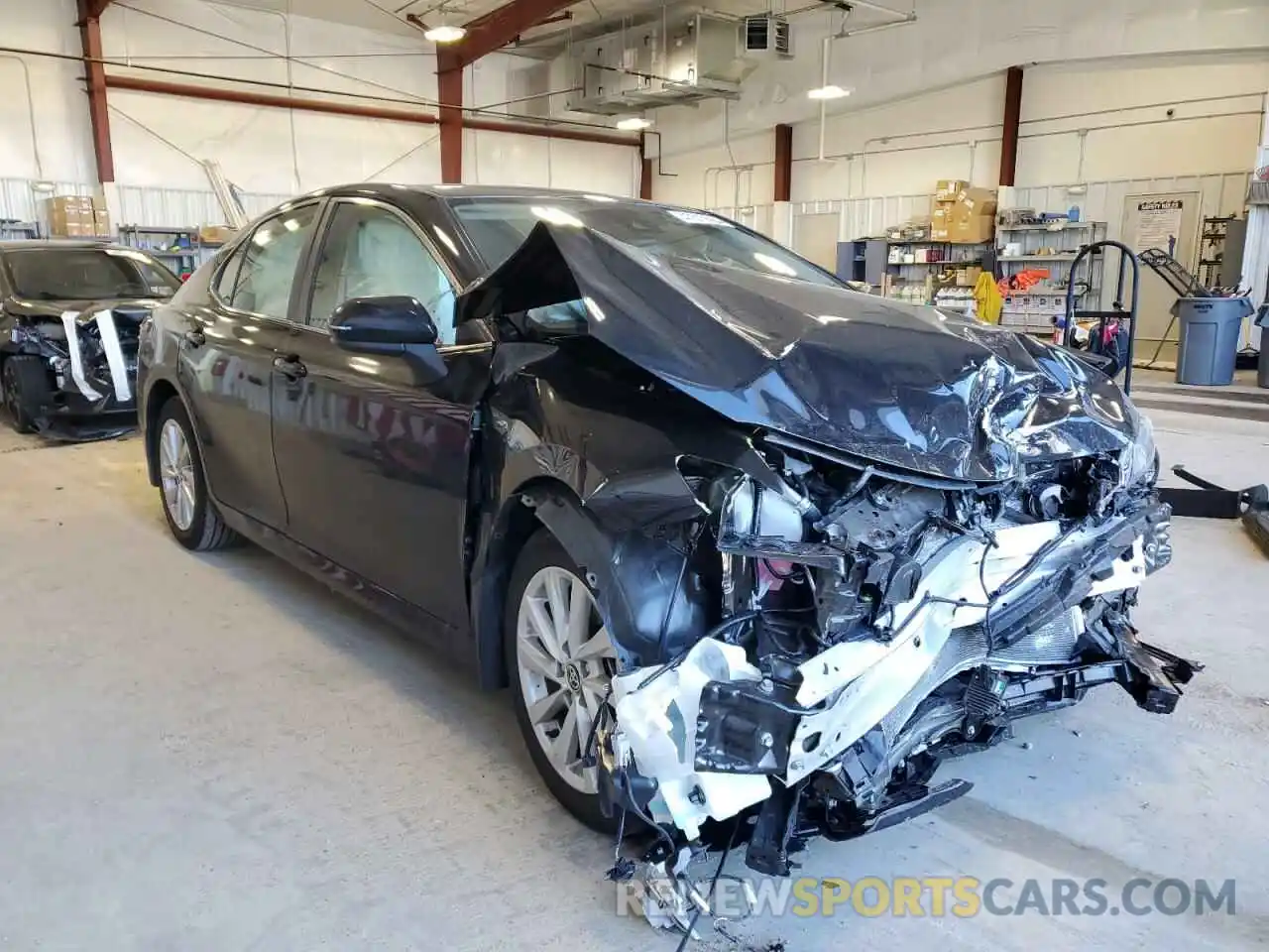 4 Photograph of a damaged car 4T1C11AK2PU127752 TOYOTA CAMRY 2023