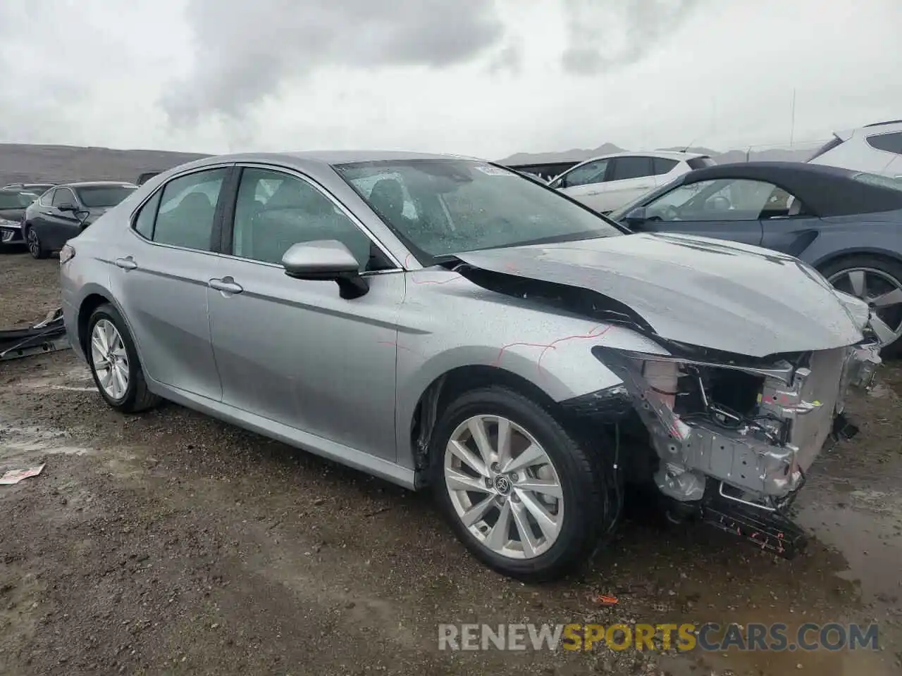 4 Photograph of a damaged car 4T1C11AK3PU828462 TOYOTA CAMRY 2023